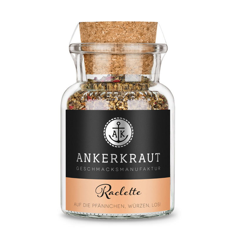 Raclette Gewürz von Ankerkraut im Korkenglas auf weißem Hintergrund.