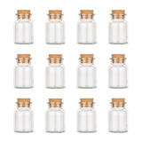 Zwölf leere Korkengläser von Ankerkraut auf weißem Hintergrund.