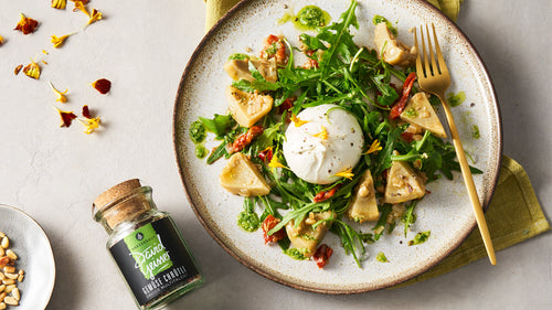 Burrata mit sautierten Artischockenböden und frischem Rucola Pesto