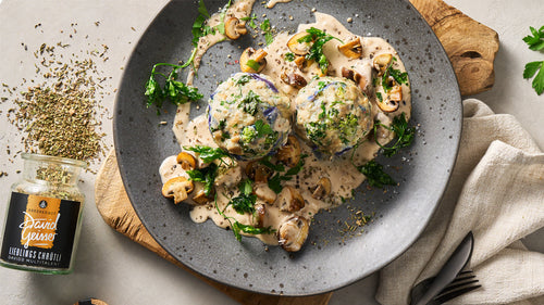 Kohlknödel an Pilzrahmsauce