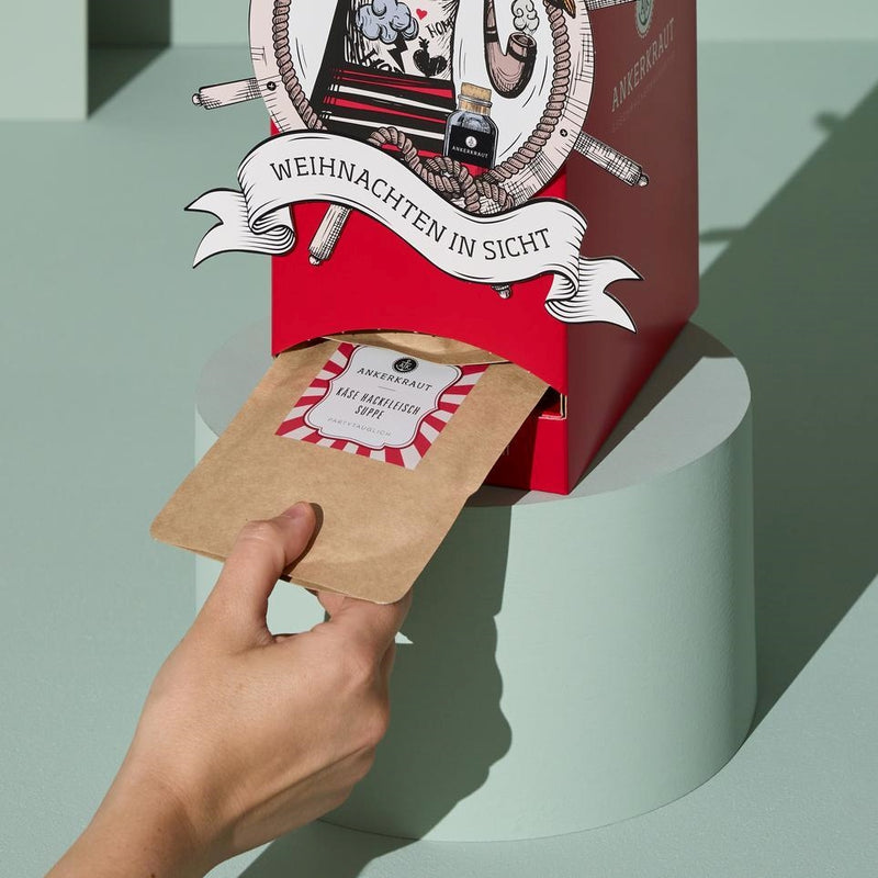 Tütchen wird aus Kochen Adventskalender gezogen