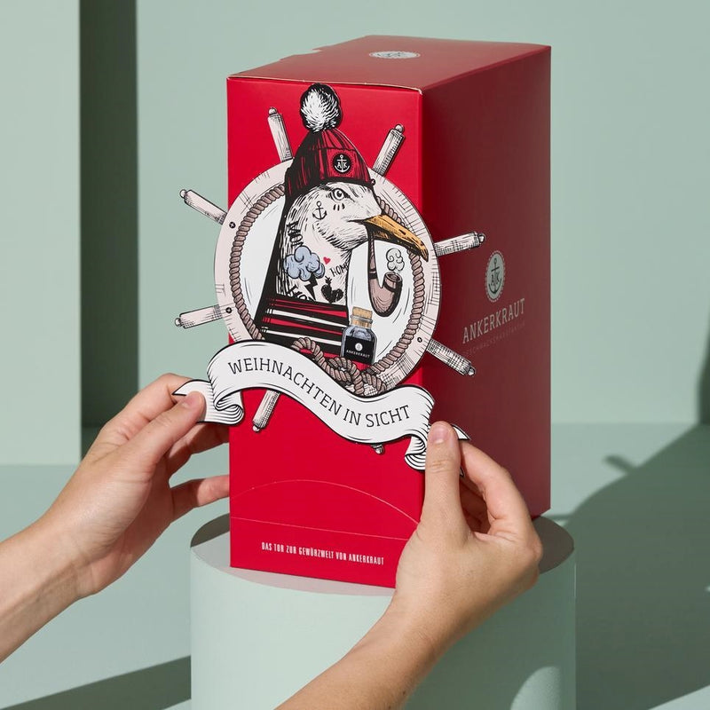 Motiv wird an Kochen Adventskalender angebracht