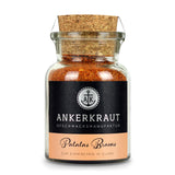 Patatas Bravas von Ankerkraut im Korkenglas auf weißem Hintergrund.