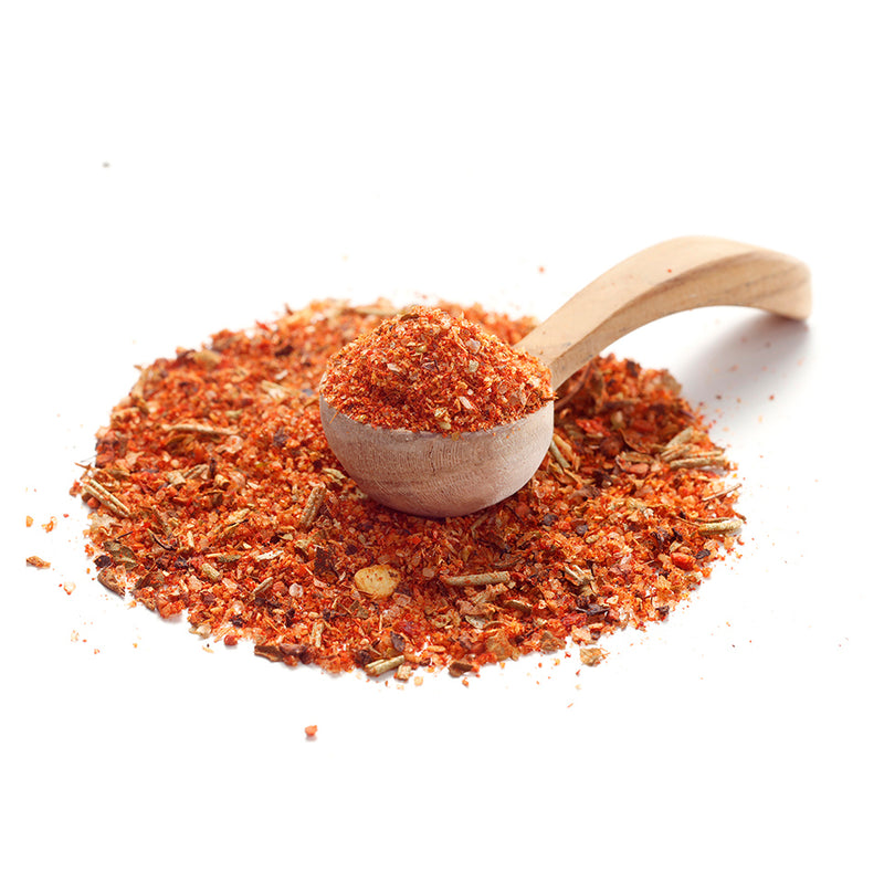 Gyros Gewürz von Ankerkraut als Häufchen auf einem Gewürzlöffel.