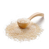 Knoblauch Ingwer Salz von Ankerkraut als Häufchen auf einem Gewürzlöffel.