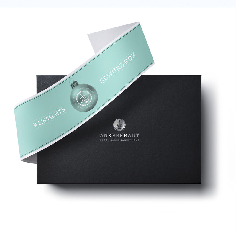Süße XMAS Geschenk Box aus schwarzem Karton mit diagonaler Banderole.